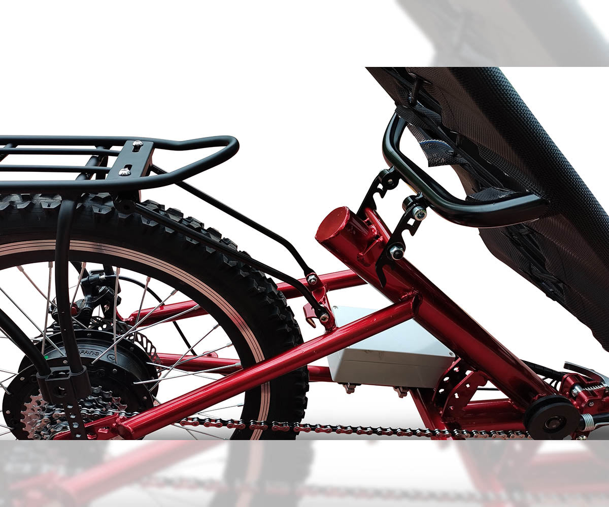 Close-up of the DuraTrike RT3e's rear seat and frame, depicting the over wheel rear rack and hub motor.