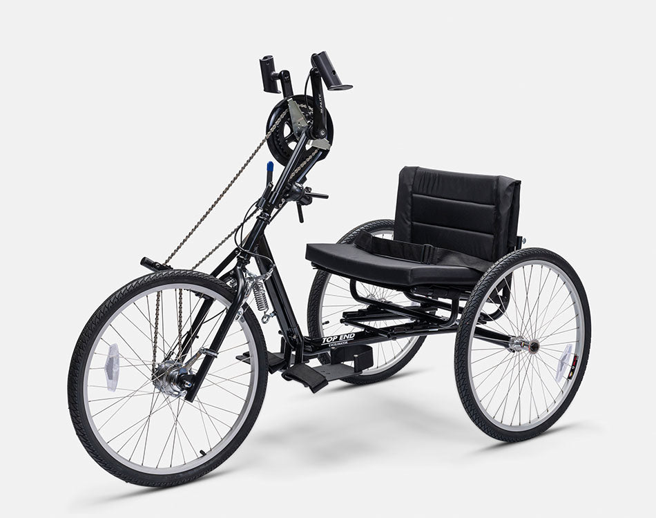 Top End Excelerator handcycle with a padded seat, elevated hand pedals, and three large wheels.