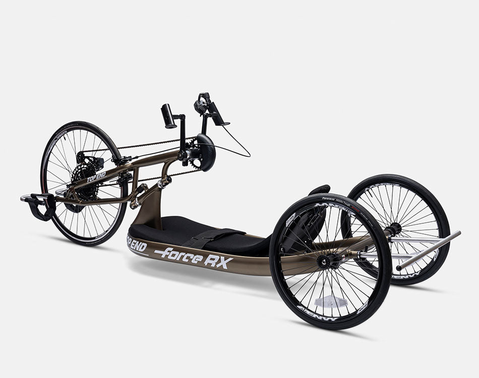 Angled side view of a Top End Force RX handcycle with las vegas bronze finish color and smooth touring wheels.