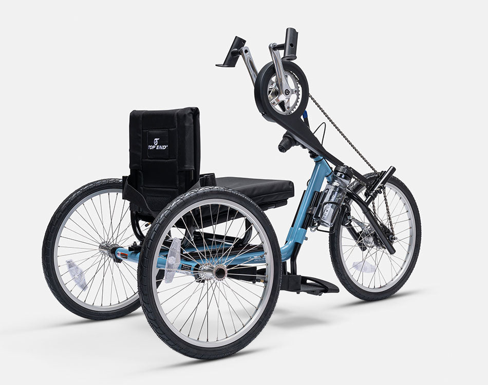 rear angle view of the Top End Lil' Excelerator Handcycle with a powder blue frame, padded black seat, and three all terrain wheels