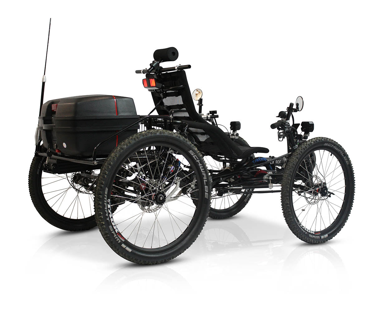 TrikExplor 424e recumbent electric assist quad with off-road tires, rear cargo box, and multiple mirrors and accessories, viewed from the side.