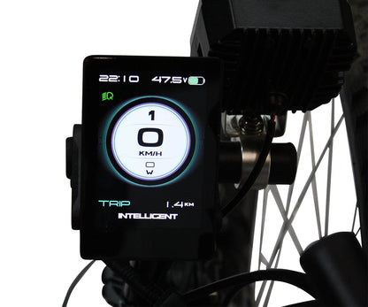 Close-up of a digital display on the TrikExplor 424e showing speed, battery level, and trip distance.