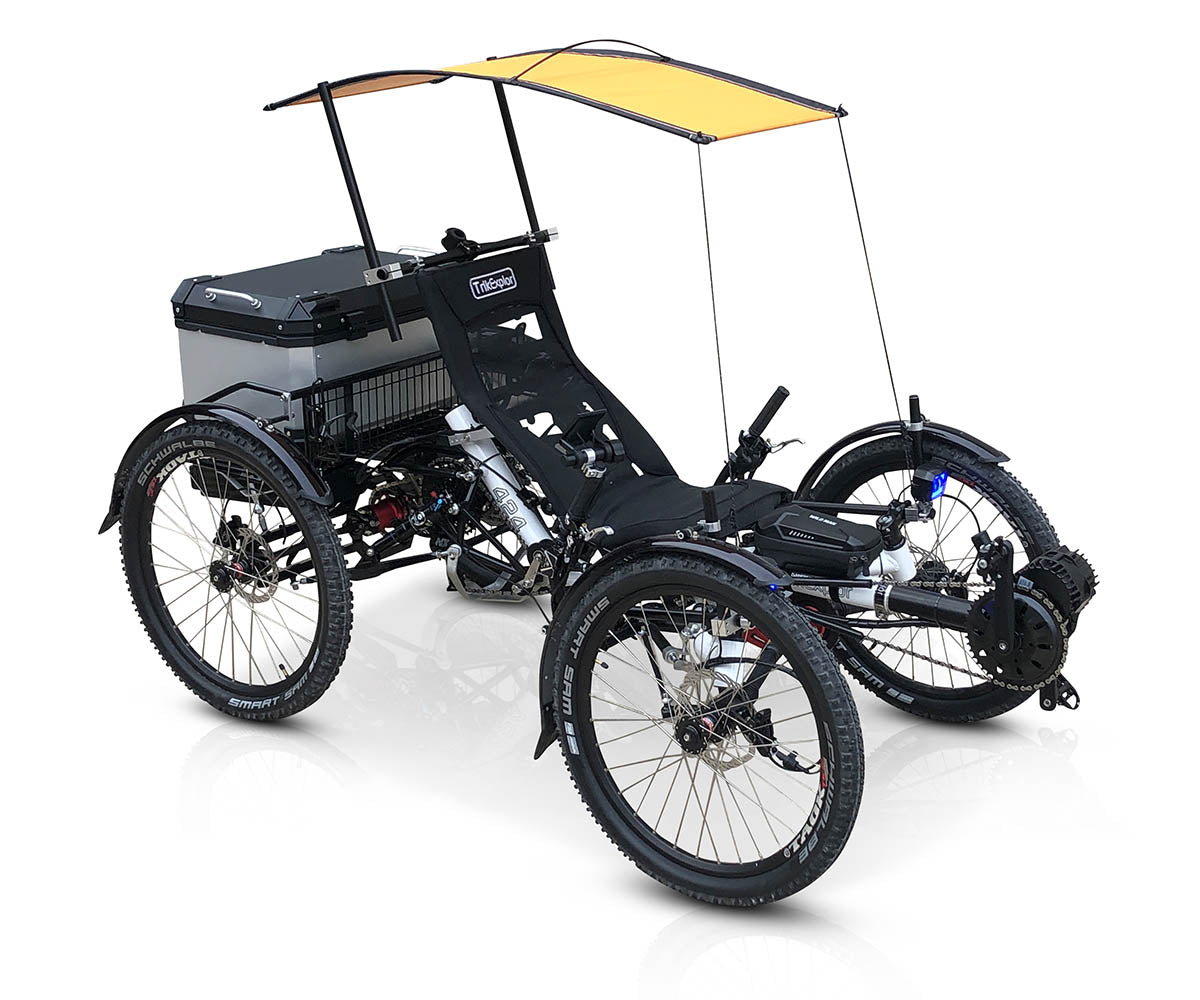 TrikExplor 424e recumbent electric assist quad with white frame, rear cargo box, and yellow canopy, viewed from an angle.