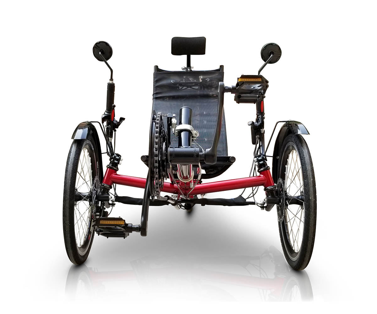 Front view of a TrikExplor FT36e red recumbent trike with black seat and handlebars, showing the three-wheel design and pedal system.