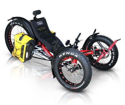 Red TrikExplor F326e tricycle with rear mounted yellow panniers. Front left angled view highlighting gear and crankset 