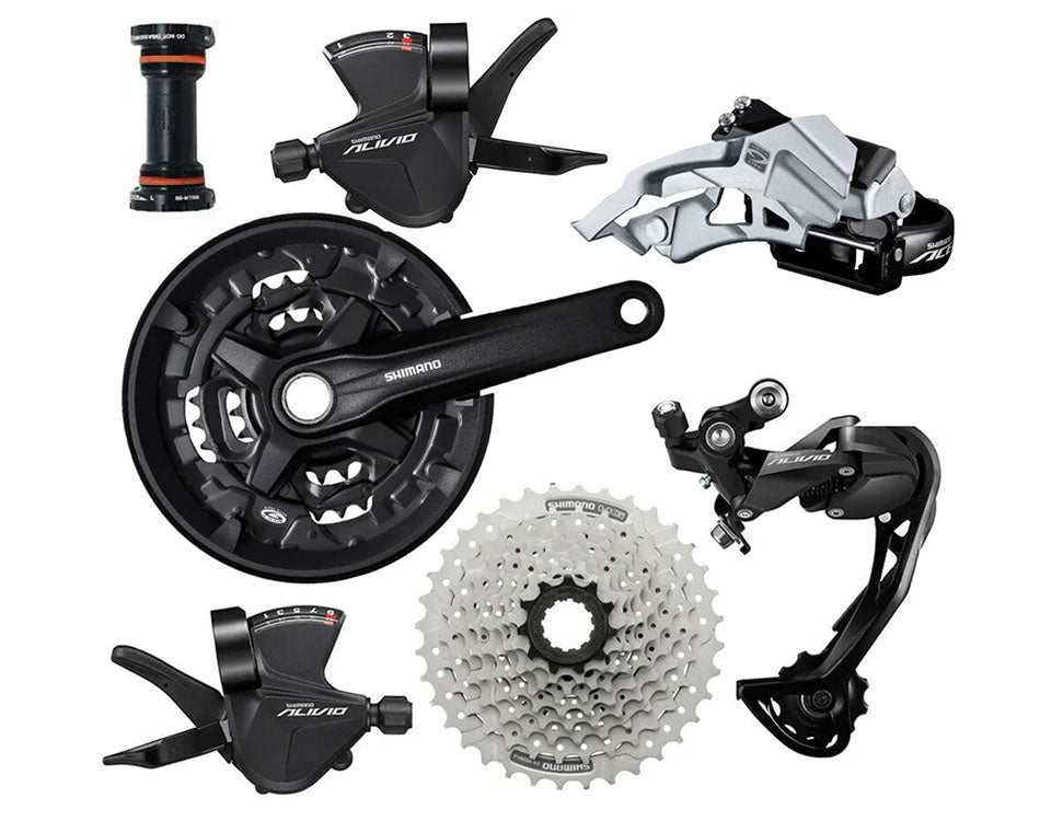 Image of Shimano brand gear shifter assembly components including derailleur, shifter, chain, and cassette 